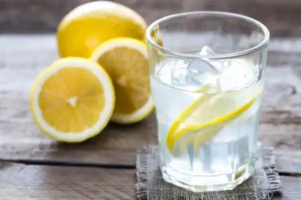 Hydration: The Secret Ingredient for a Toned Stomach and Enhanced Fitness 2 Image of lemon water to aid hydration Matlock